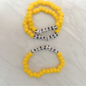 A pack of 3 Taylor Swift Fearless friendship Bracelets